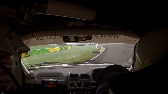 Kieron picking up a marker board.